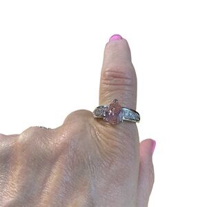 Avon silvertone pear shaped pink CZ ring size large NIB